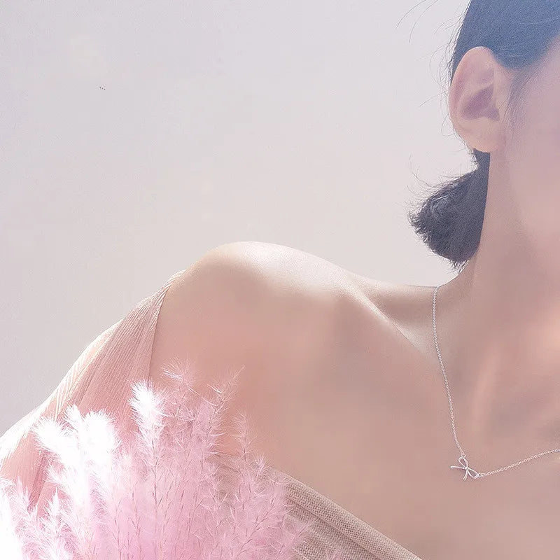 Dainty Silver Bow Necklace