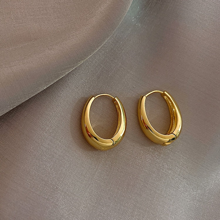 Gold Oval Huggie Earrings