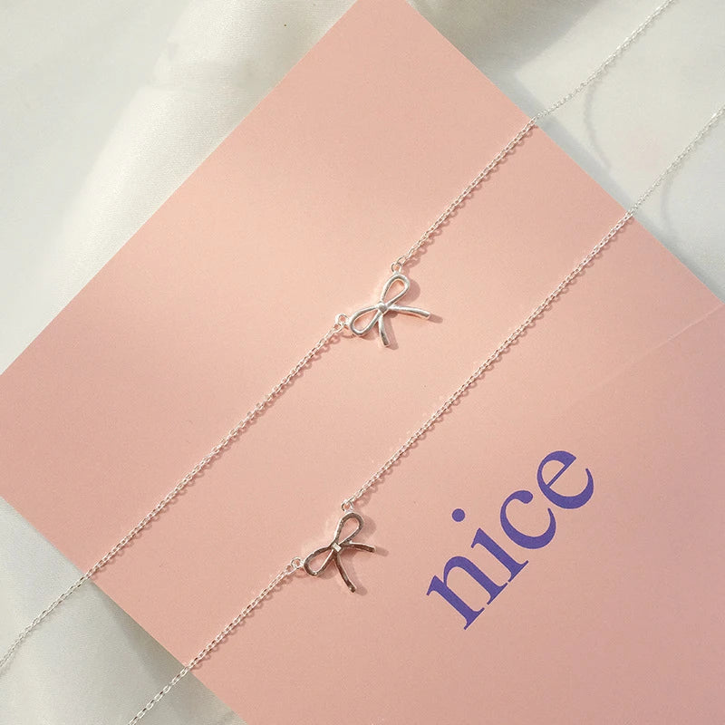 Dainty Silver Bow Necklace