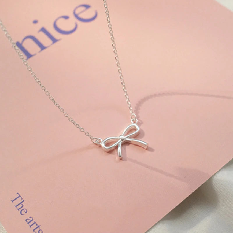 Dainty Silver Bow Necklace